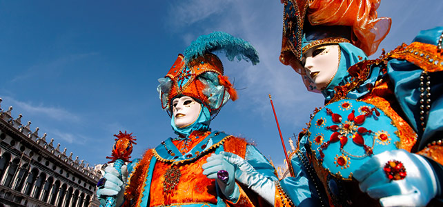 Carnevale Venice Italy - revelers in costumes and masks