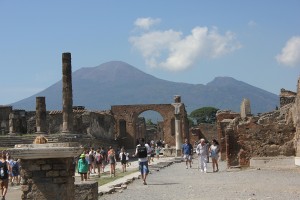 Temple Of Jupiter, Vesuvius Volcano and people in Pompei